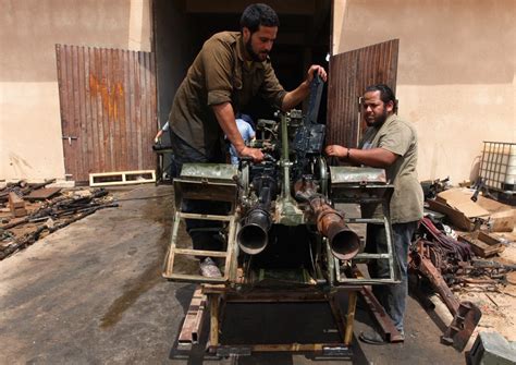 mudding gun Libya|Inside the DIY Weapons Workshop of the Libyan Rebels.